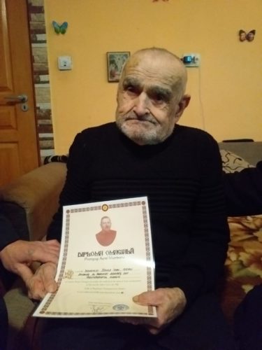 Diploma Omagială Protopop Martir Aurel Munteanu , oferită unui credincios din Protopopiatul Huedin, la împlinirea vârstei de 100 de ani